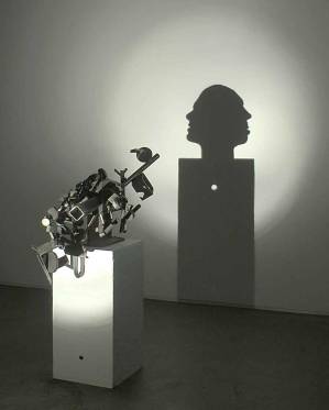 TIM NOBLE & SUE WEBSTER, 2003 | "A hole" (Welded scrap metal, wood, light projector, 85 x 30.5 x 60 cm)